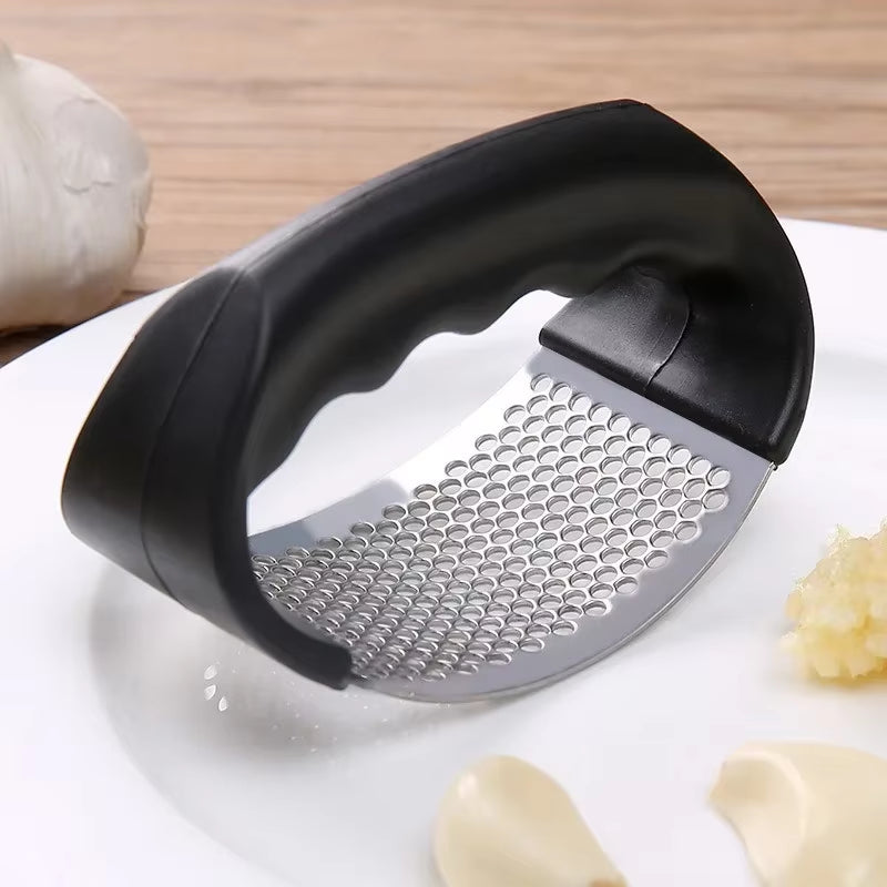 Stainless Steel Manual Garlic Press and Chopper - Versatile Kitchen Gadget for Fruits and Vegetables