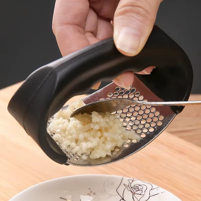 Stainless Steel Manual Garlic Press and Chopper - Versatile Kitchen Gadget for Fruits and Vegetables